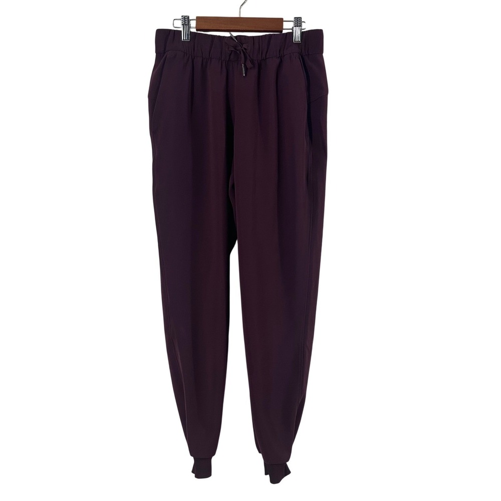 Lululemon On the Fly Jogger Pants Plum Purple Size 4 7/8 Length Ribbed Cuffs